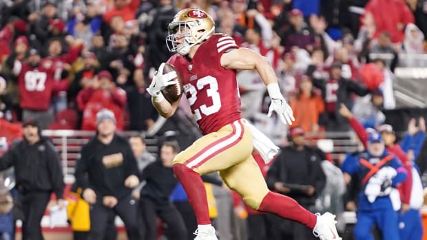 January 20, 2024; Santa Clara, CA, USA; San Francisco 49ers running back Christian McCaffrey (23) runs to score a touchdown against the Green Bay Packers during the third quarter in a 2024 NFC divisional round game at Levi's Stadium. Mandatory Credit: Kyle Terada-USA TODAY Sports